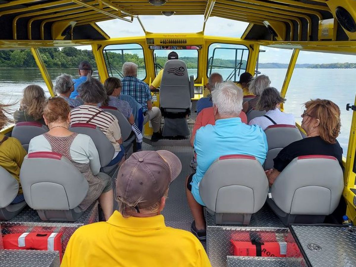 a group of people sitting on a bus